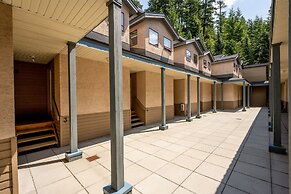 Cozy Creekside Two-Storey Condo