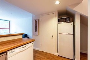 Cozy Creekside Two-Storey Condo