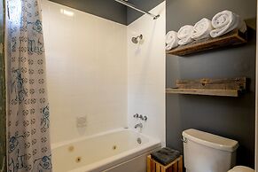 Cozy Creekside Two-Storey Condo