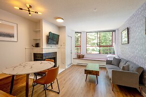 Cozy Creekside Two-Storey Condo