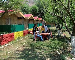 Tirthan Village Huts