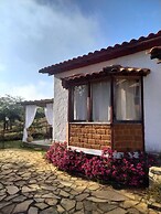 Serra a vista chalés