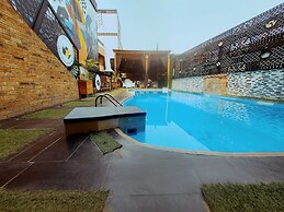 OLYMPUS HOTEL & SUITES