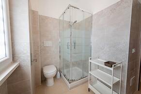 Casa Rosa Beige e Blu