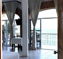 Traditional Sierra Leon Oceanfront Rooms