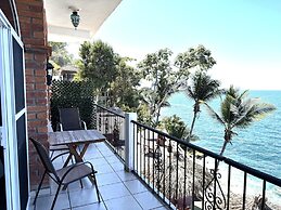 Traditional Sierra Leon Oceanfront Rooms