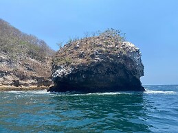 Traditional Sierra Leon Oceanfront Rooms