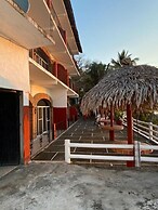 Traditional Sierra Leon Oceanfront Rooms
