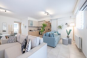 Luxury Loft with a Balcony by CloudKeys