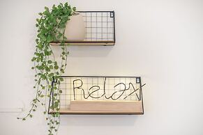 Luxury Loft with a Balcony by CloudKeys