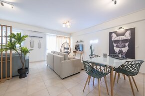 Luxury Loft with a Balcony by CloudKeys