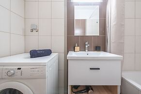 Luxury Loft with a Balcony by CloudKeys