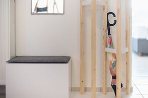 Luxury Loft with a Balcony by CloudKeys