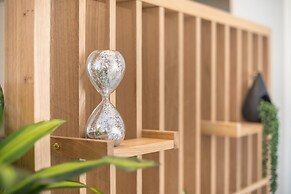 Luxury Loft with a Balcony by CloudKeys