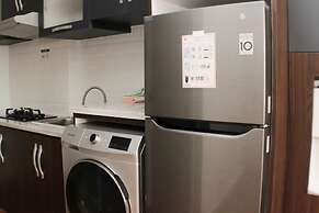 Homey And Minimalist 2Br At Patraland Urbano Apartment