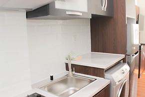 Homey And Minimalist 2Br At Patraland Urbano Apartment