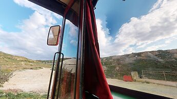 Gozo Bus Glamping - Stay on a 1974 Vintage Maltese bus in Xlendi