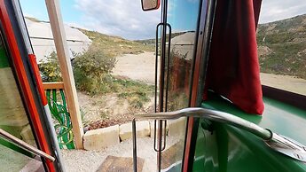 Gozo Bus Glamping - Stay on a 1974 Vintage Maltese bus in Xlendi