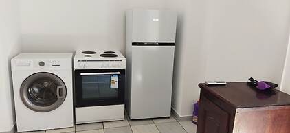 Perissa Art Villa - Kitchen & Washing Machine