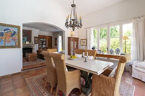 Provencal in a Height Overlooking Greenery