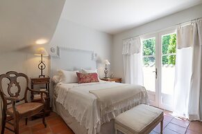 Provencal in a Height Overlooking Greenery