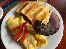 hotel y hostal nojoch che