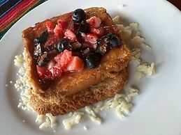 hotel y hostal nojoch che