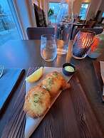 Torsken Brygge - Senja by Heart