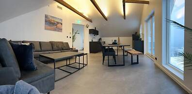 Torsken Brygge - Senja by Heart