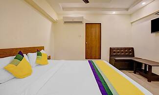 New Harshita inn By Glitz Hotel