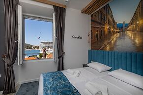 Apartments and rooms Naida