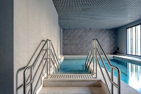 Studio com piscina aquecida e AC