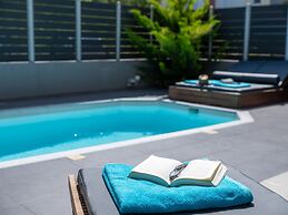 Grey House by Checkin