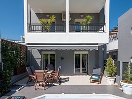 Grey House by Checkin