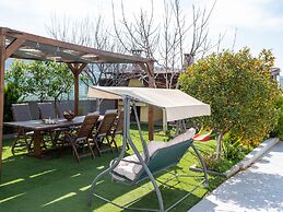 Grey House by Checkin