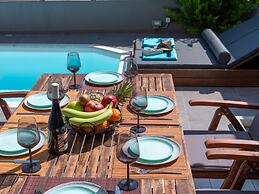 Grey House by Checkin