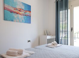 Grey House by Checkin