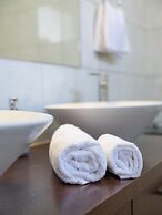 Grey House by Checkin