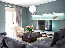 Grey House by Checkin