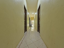 Oyo 90596 Casaria Inn