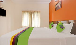 Treebo Trend Green Palm Resorts