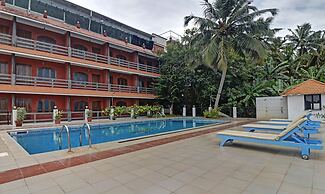 Treebo Trend Green Palm Resorts