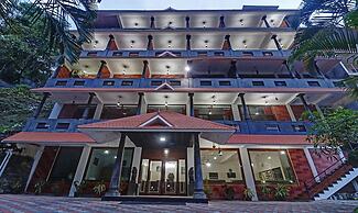 Treebo Trend Green Palm Resorts