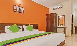 Treebo Trend Green Palm Resorts