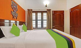 Treebo Trend Green Palm Resorts