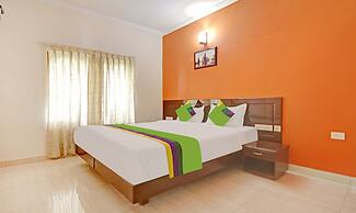 Treebo Trend Green Palm Resorts