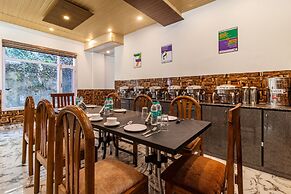 Treebo Srishti Vaikunth With Mountain View