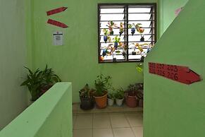 Spot On 90625 Super Green Grass Hotel