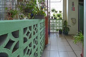 Spot On 90625 Super Green Grass Hotel