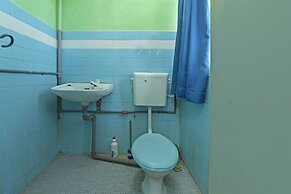 Spot On 90625 Super Green Grass Hotel